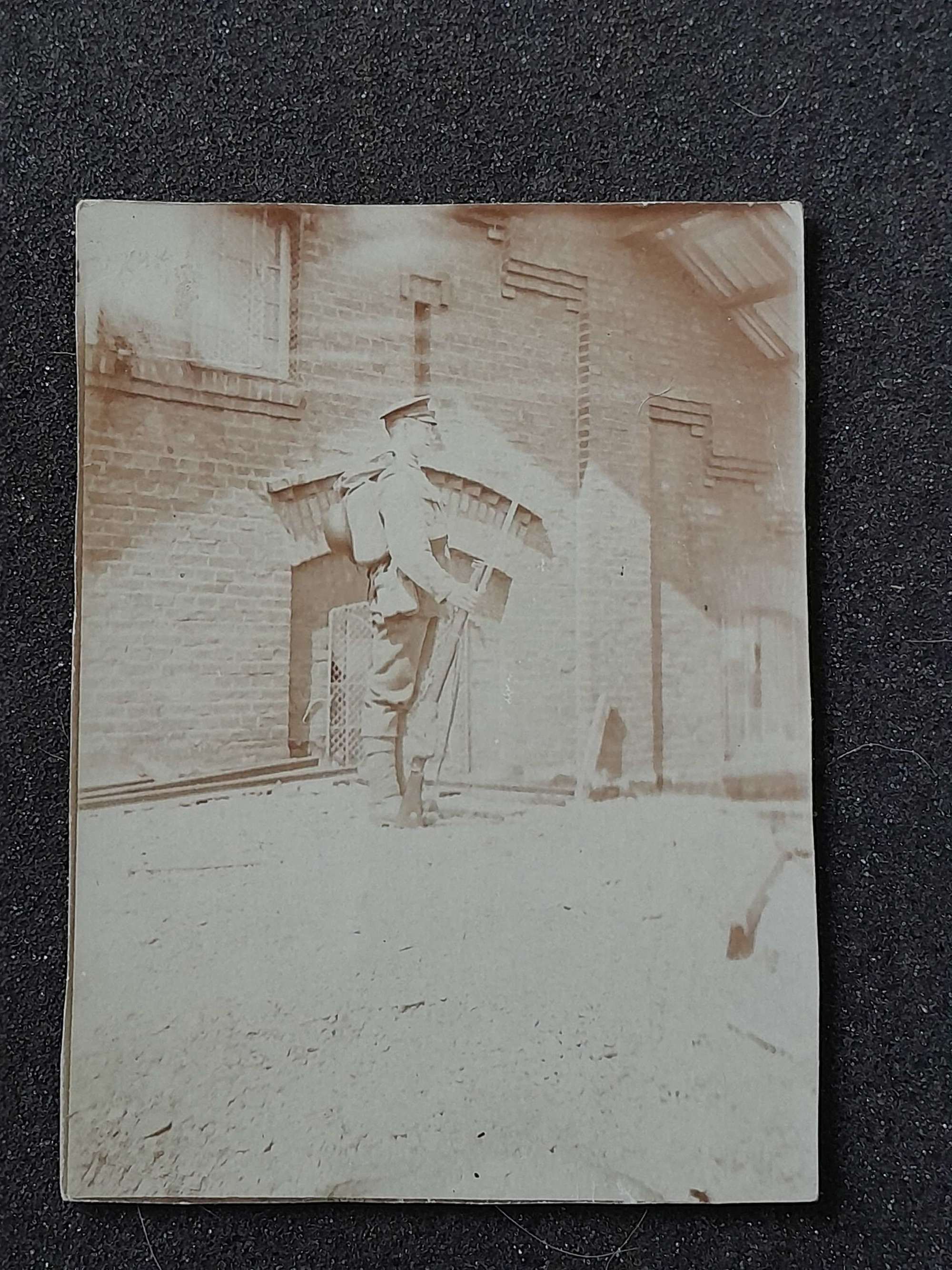 Photo Postcard of Soldier standing guard