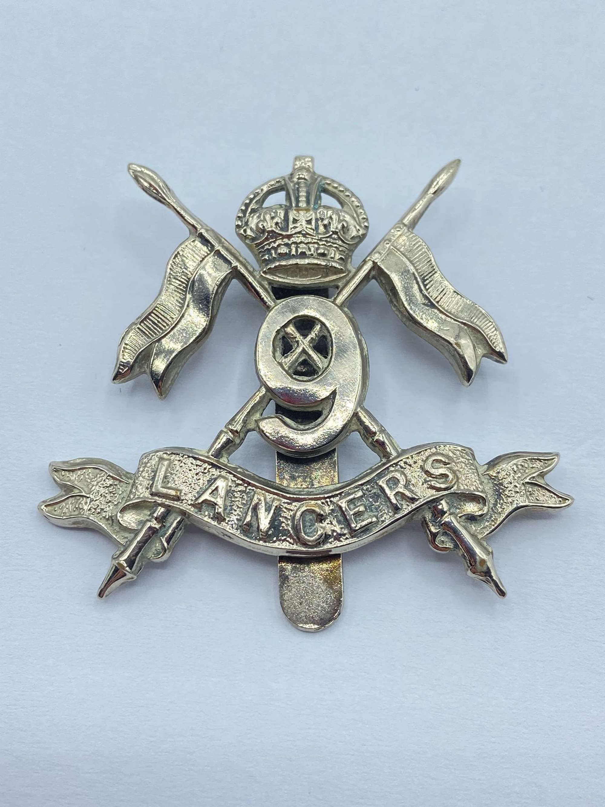 WW2 Period British 9th Queen's Royal Lancers Slider Cap Badge