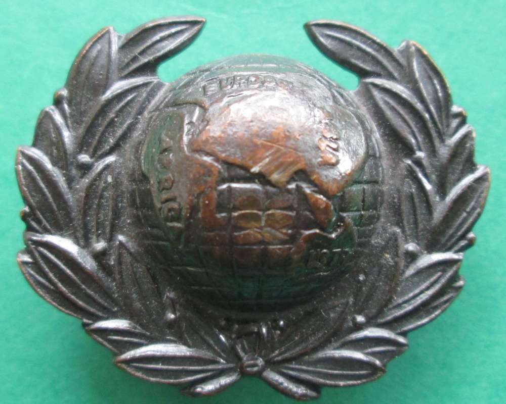A ROYAL MARINES COLLAR BADGE