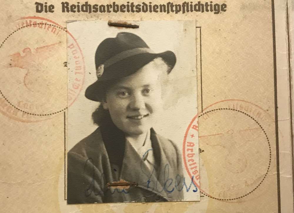 Female RAD service book with two photos