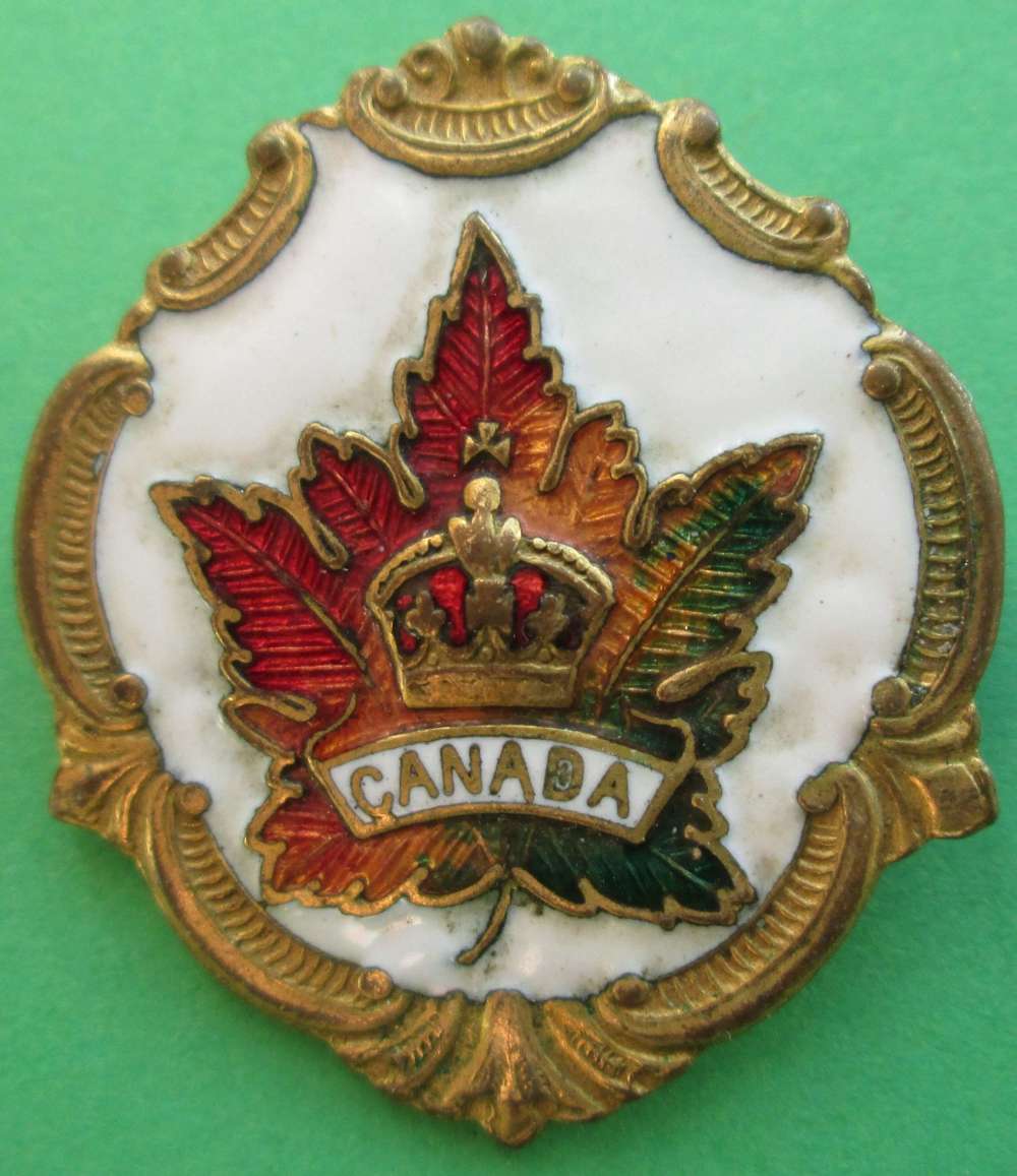 A WHITE FACED ENAMEL CANADA SWEETHEART