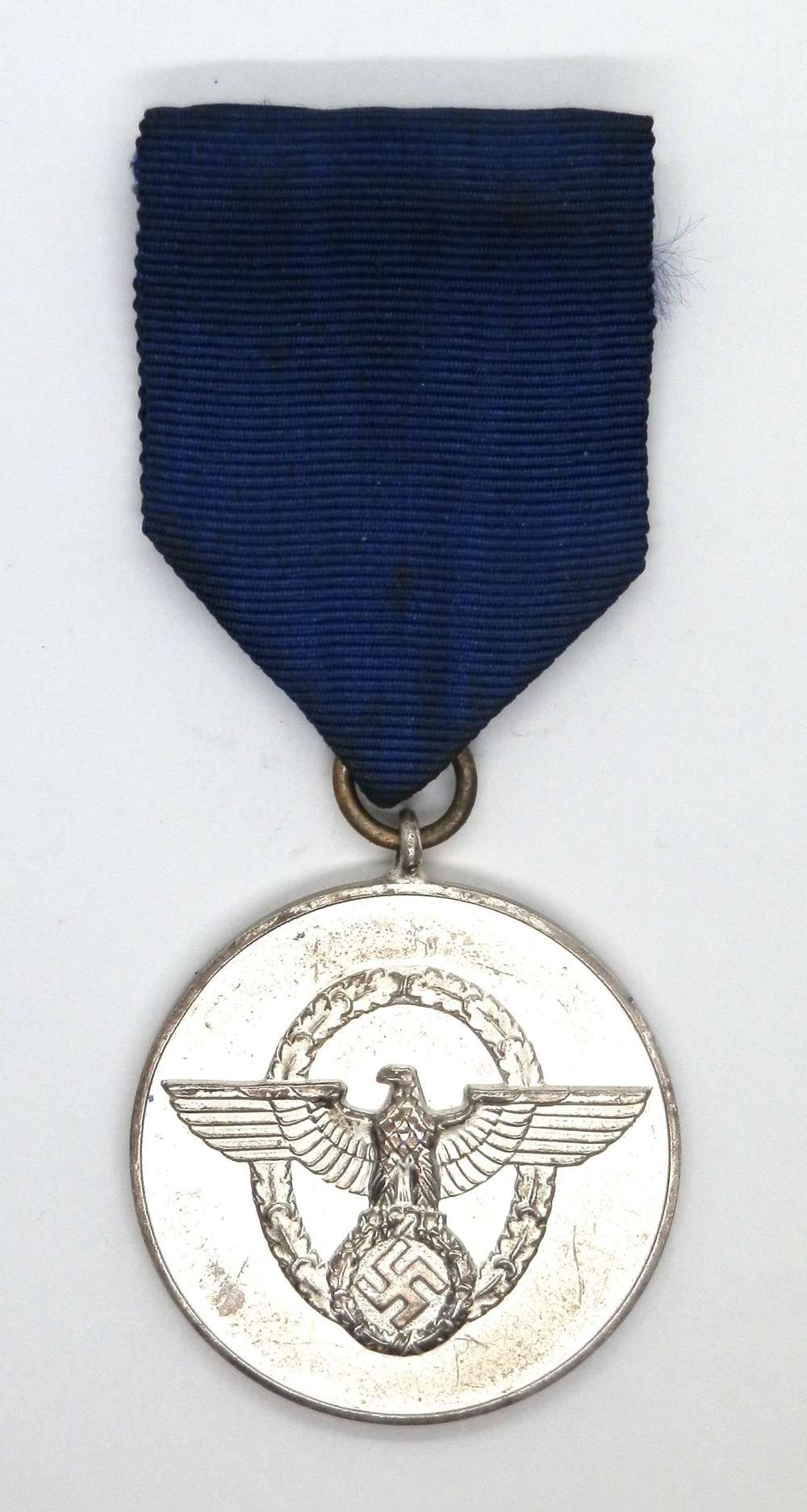 Police Loyal Service 3rd Class 8 Years Medal.