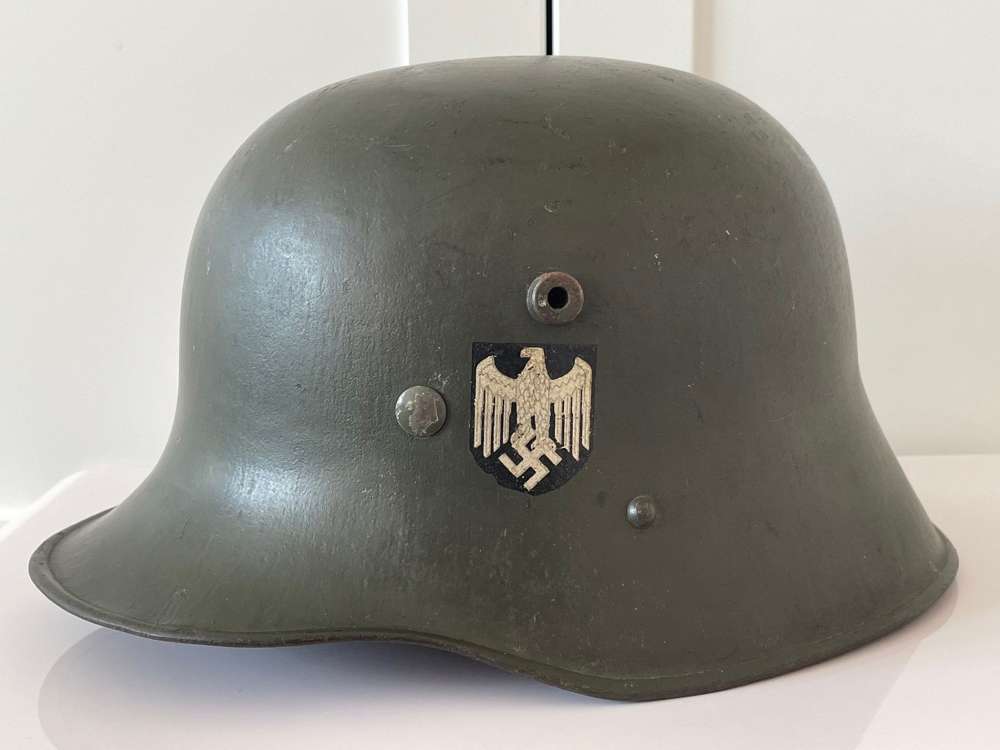  WWI GERMAN HELMET REFURBISHED IN THE 1930s.