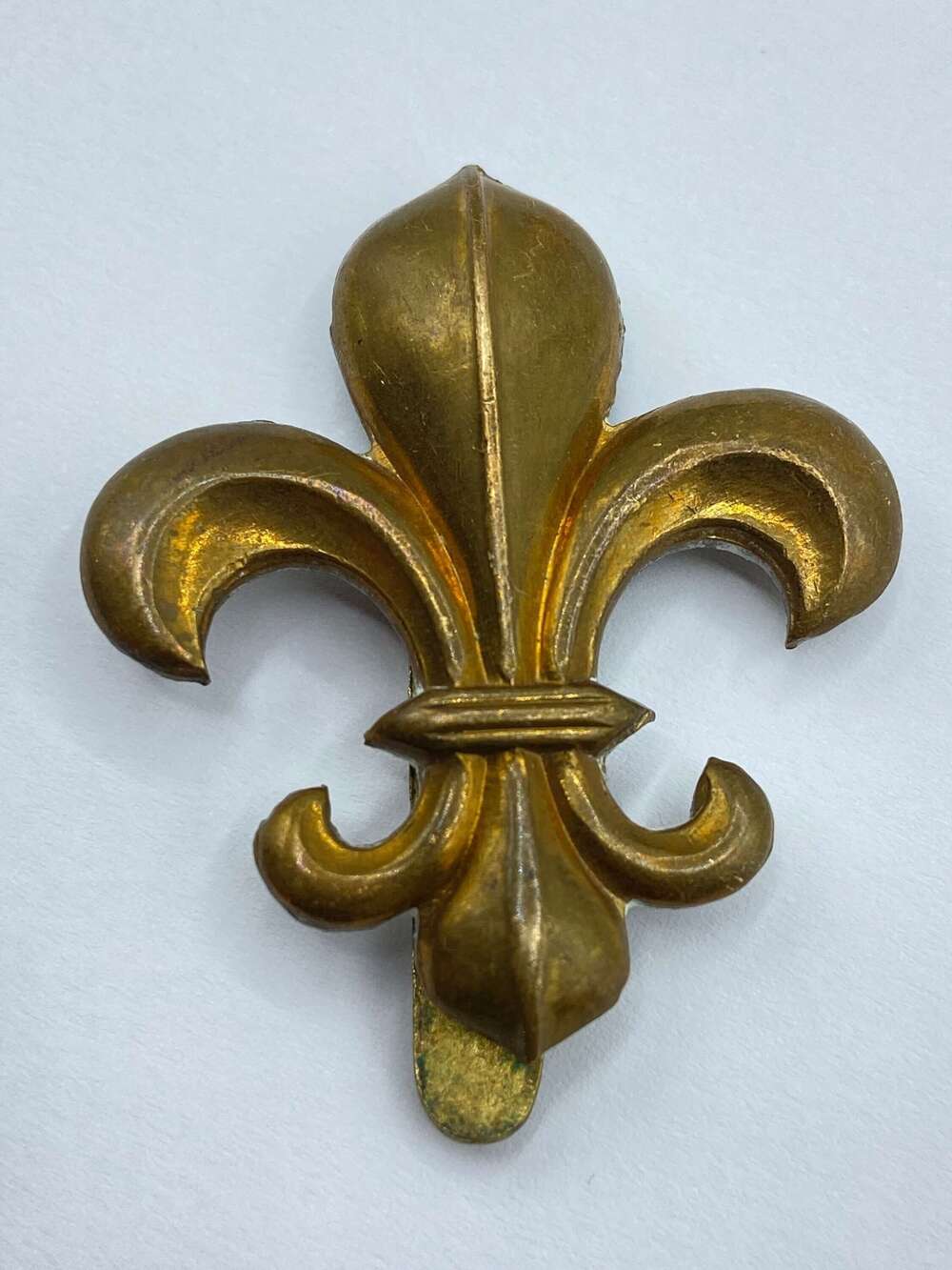 WW2 Period British Manchester Regiment Slider Cap Badge