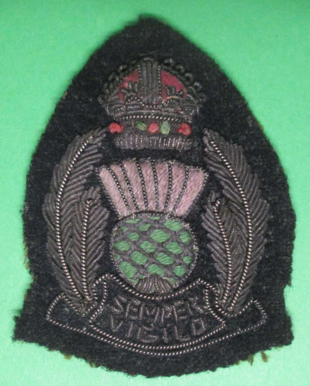 A Scottish police cloth and bullion wire badge